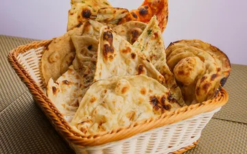 Indian Bread Traditions: A History of Roti, Naan, and Paratha