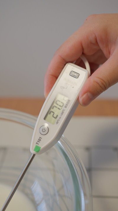 ThermoWorks RT600C pocket thermometer measuring liquid temperature